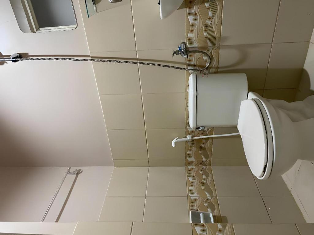 Oyo 766 Ichehan Apartments Манила Екстериор снимка