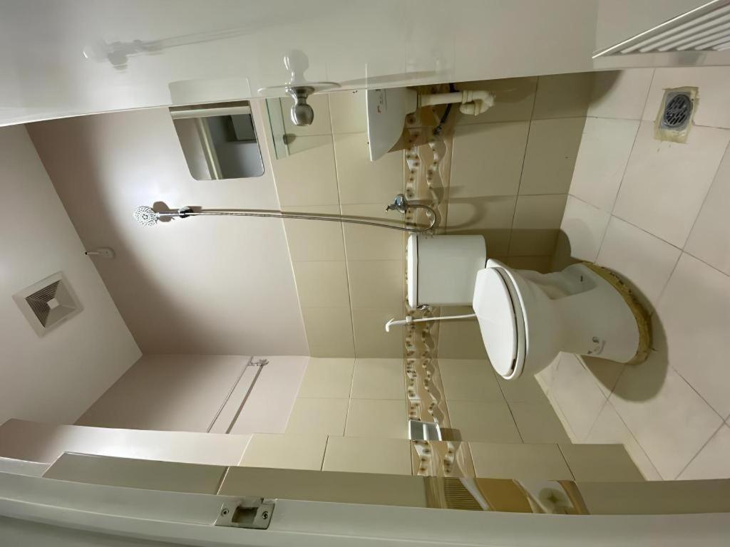 Oyo 766 Ichehan Apartments Манила Екстериор снимка